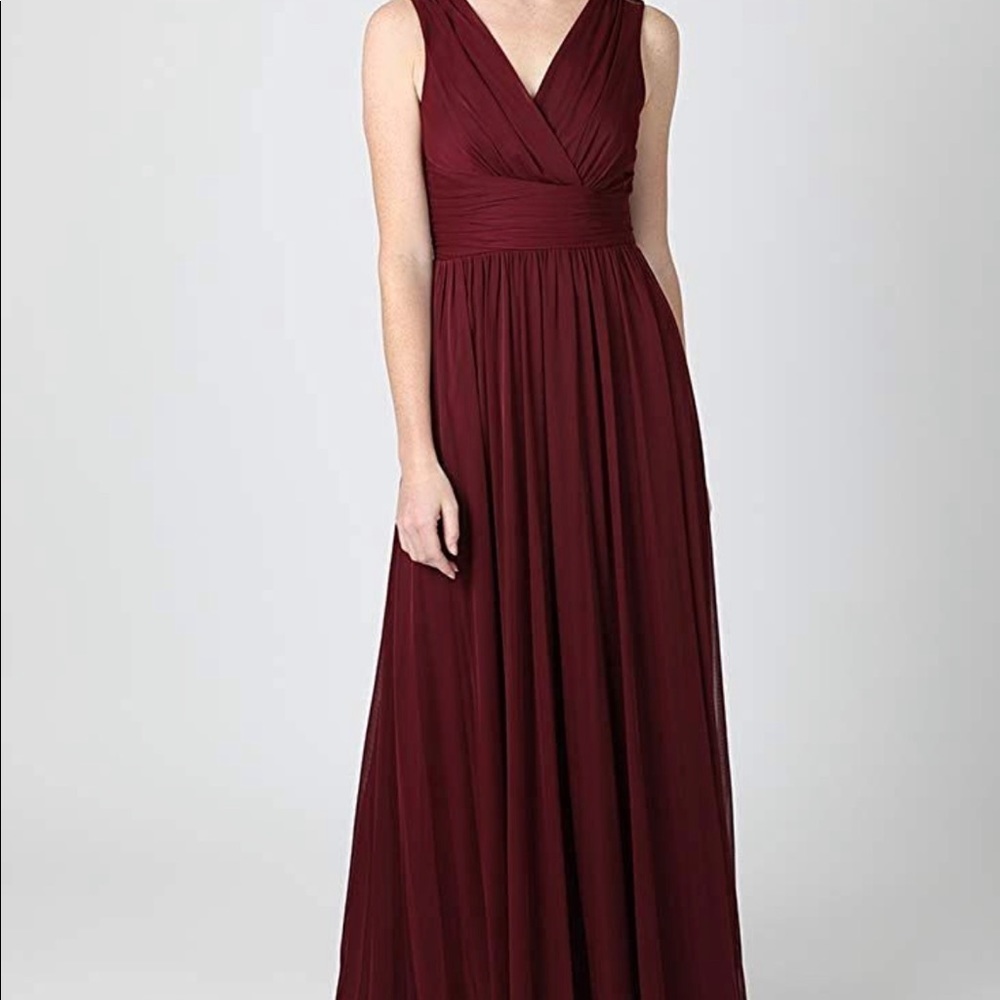 Size 4 NWT Surplice Neck Maxi Dress in Merlot. Pet free and smoke free home.
